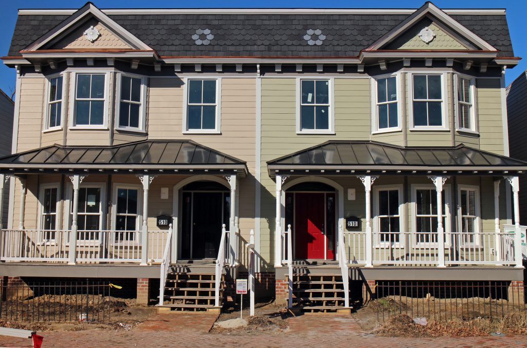 Two early 20th century-style town houses have replaced an anachronistic home in Church Hill. Photos by Katie Demeria.