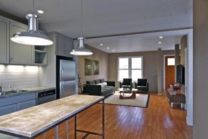 A rendering of the first floor of one of the three-story townhomes, which will vary between three- and four-bedroom units.