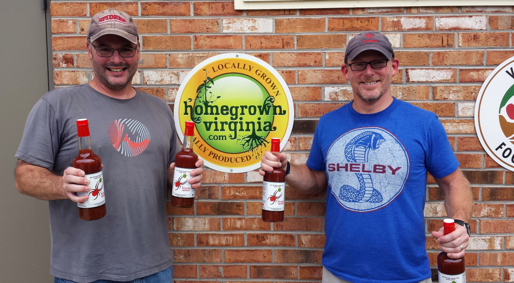 Craig Hammitt (left) and Grady Hebert  after bottling the first batch of Bloody Spider Bloody Mary mix. Courtesy of Spider Specialty Foods. 